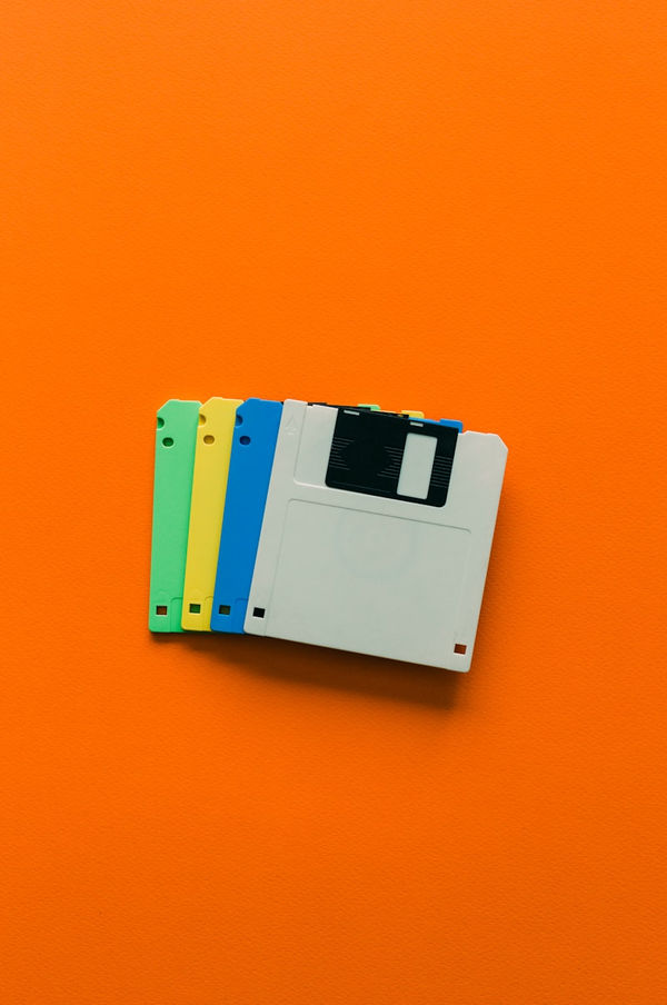 Floppy disks on a orange background